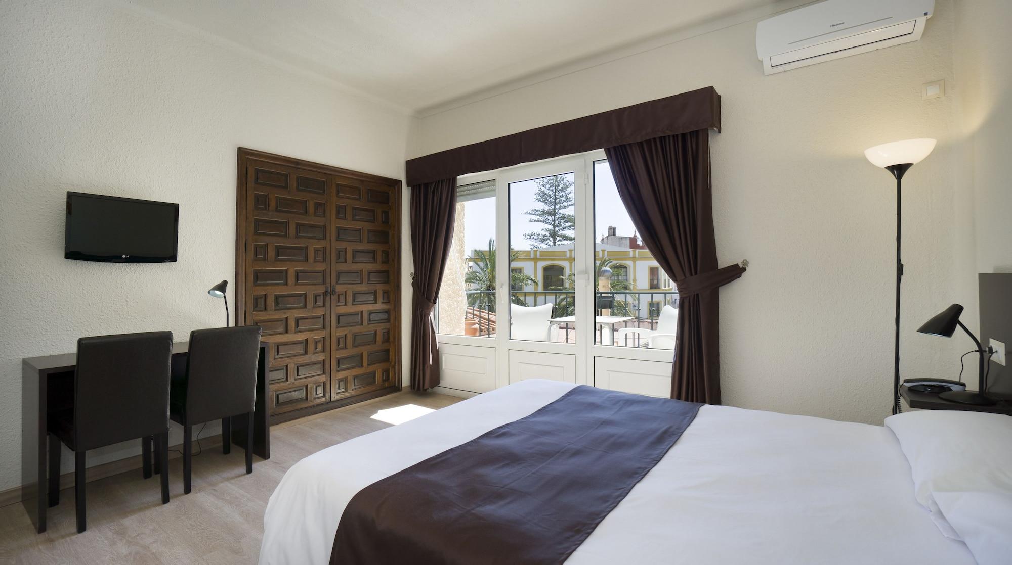 เอล โปโซ Hotel ตอร์เรโมลิโนส ภายนอก รูปภาพ